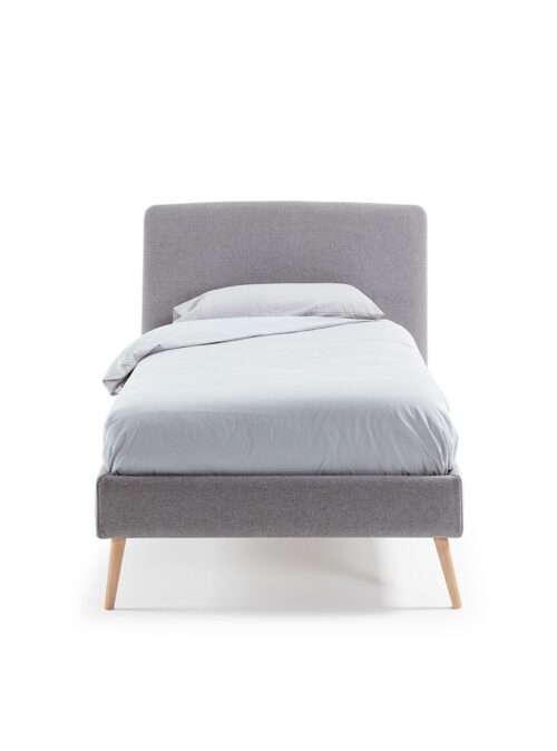 cama individual color gris con cabecera