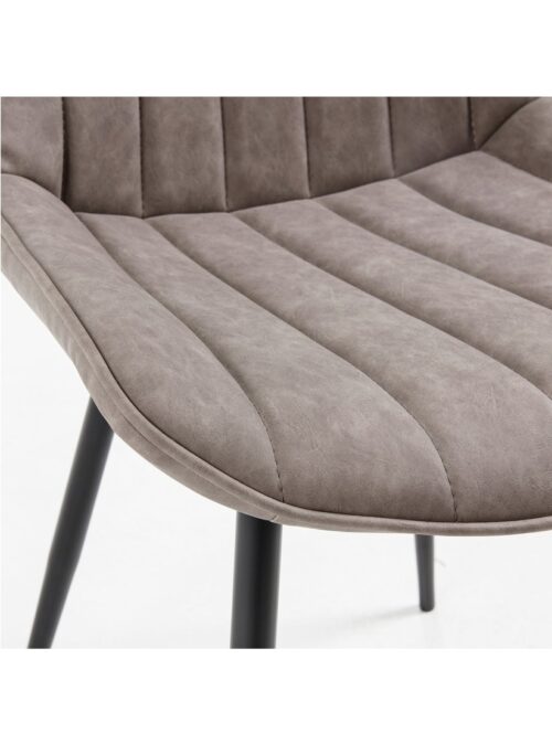 detalles de costuras en silla de color gris