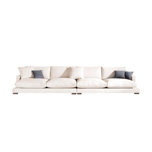 Sofa blanco de cuatro plazas con cojines